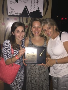 Accepting the Gold Bell award for SHIFT are (from left to right) Liz Ianotti, Jennifer Toole and Annie Perkins.