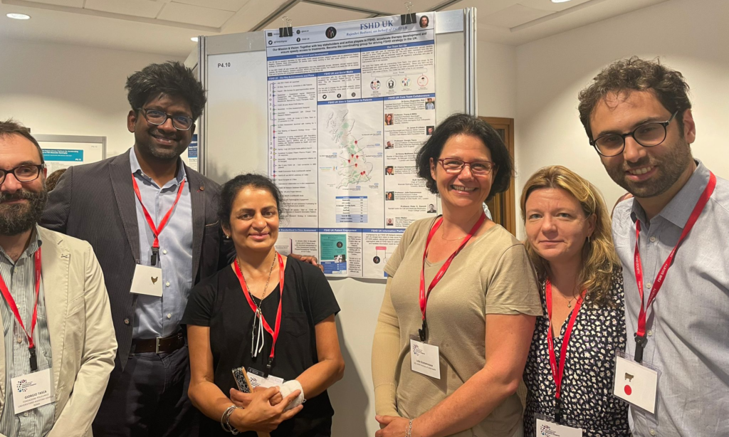 Photograph of Giorgio Tasca, Channa Hewamadduma, Rajeshri Badiani, Julie Dumonceaux, Emma Matthews, Enrico Bugiardini posing in front ot poster presentation.