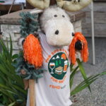 The moost mascot for the Sips & Smores wears the event t-shirt and greets participants.