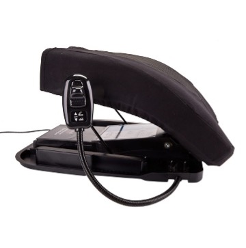 A white background with a black assistive cushion in the foreground. The cushion resembles a chair seat that moves upwards and outwards from the base.